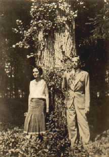 Eugene & Carlotta O'Neill standing in front of large tree